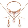 Boucles d'oreilles collier élégant en acier au titane plaqué or rose coquille blanche bijoux pour femmes en forme de coeur multi-combinaisons en option