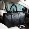 Factory wholesale men bag hand-woven black handbags classic woven leather travel bags outdoor travels fitness leathers handbag