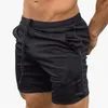 2021 Mężczyźni Running Shorts Sports Siłownia Kompresja Telefon Kieszonkowy Zużycie pod warstwą bazową Krótkie spodnie Athletic Solid Lights