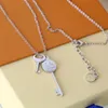 Europe America New Style Men Lady Women Gold and Silvercolour Hardware Engraved V Initials Double Key Pendant Long Necklace MP286984544