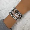 Perlenstränge DIEZI 5 Farben Bohemian Ethnic Soft Clay Imitationsperlen-Armband-Sets für Frauen Mehrfarbige Buchstaben Perlen Schneemann Inte22