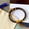 Bracciale con lettera di lusso Braccialetti in oro Donna Uomo in pelle a doppio ponte Fibbia in oro di alta qualità Bracciale con serratura di marca Pendenti Annivers2975