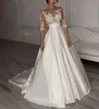 2022 Satin Bröllopsklänningar Boho Halv ärmar Bow Pocket Bridal Dress Lace Appliques Bröllopsklänning Anpassad Made Robe de Marie