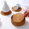 Mats Pads 6pcs Sottobicchieri per tazze in rattan intrecciato a mano con cestino Tovaglietta antiscivolo Vassoi da tè Tazze da caffè Tovaglietta isolante Stoviglie