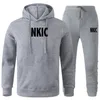 2 stycken uppsättningar märke TRACKSUIT kvinnor män brevtryck jogging män set sport kostym man bomull hoodie + byxor sportkläder pojke s-xxxl