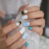 Faux ongles bleu clair onirique conçu ongle princesse horloge moyen paillettes faux carré enfantin artificiel Prud22