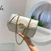 74% OFF sac Designer sacs Outlet Store nouveau long sac à main Mini main ondulation de l'eau une épaule oblique chaîne femmes bagYK2E