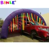 Grande tente gonflable colorée de tunnel d'arc-en-ciel de 4mwx4m avec des rideaux de glands arcade de porte d'entrée d'événement pour la décoration de Pary