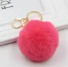 Véritable boule de fourrure de lapin porte-clés fête multicolore doux pompons sac boucles d'oreilles en peluche support de voiture pendentif or chaînes en métal porte-clés