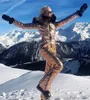 カジュアルジャケットの光沢のあるコートシルバーゴールドワンピーススキースーツ女性防水防風スキージャンプスーツスノーボード女性雪の衣装