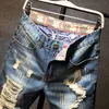 Jeans corti strappati da uomo estivi Streetwear Big Hole Fashion Vintage Blue Slim Denim Shorts Abbigliamento di marca 210806