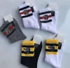 Hochwertige Designer-Herren-Baumwollsocken von Luxur mit Tiger- und Wolfskopf-Stickerei, mittelhoher Schlauch, Freizeit, Sport, Hip-Hop, schwarz-weiße Socke