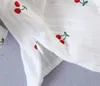Kvinnors sp￥rningsdr￤kter europeiska Slim V-ringning Kort ￤rm toppar t-shirt Twisted Cherry Ruffle Sexig minikjol Tv￥ stycken Set Girl Female 88p6