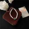 Nischen-Armband mit Perlen, vierblättrig, für Freundinnen, weibliches Temperament, Handschmuck, Gliederkette