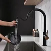 Le robinet universel multifonctionnel en alliage de zinc avec poignée unique mixte et rotation à 360 degrés convient au lavabo de la cuisine