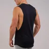 Muscleguys blanc gymnases débardeurs hommes solide musculation vêtements Fitness hommes Singlet entraînement sans manches Stringer chemises