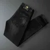 Jeans herfst mannen slim fit kleine voeten internationaal Koreaans Eagle print mode merk