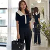 夏の韓国のエレガントニットトップスTシャツ女性半袖ターンダウンカラーカラーブロックシングルブレストファッション210513