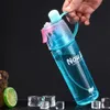 400 ml de 600 ml de botella de agua a prueba de fugas para beber plástico Tour de alta calidad Bicicletas al aire libre Sports alrededor de 180 g y0915