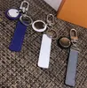 2021 Klassisk Svart / Vit / Grå PU Läder Key Chain Ring Tillbehör Modebil Keychain NE0 Club Keychains Spänne För Män Kvinnor Med Retail Box YSK09