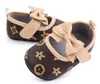 Första vandrare 2023 Luxury Butterfly Knot Princess Shoes For Baby Girls Soft Soled Flats Moccasins Toddler Crib Toddler Shoes Baby Fashion