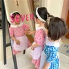Korean style summer girls plaid short sleeve dresses doll collar cotton bib dress 1-6Y 210615