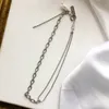 Justine Clenquet -kedjhalsband med zirkonmetall lapptäcke Pärla choker halsband armband244z9186832