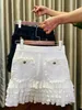 春のヨーロッパのファッションデザイン女性のプリーツスカート弾性ウエストニットフリルショートスカートSM L