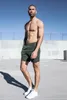4 ألوان الرجال السراويل الرياضية اللياقة الجري في الهواء الطلق ملابس الشاطئ عارضة