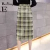 Femmes jupe portefeuille Midi boutons laine irrégulière Vintage Plaid loisirs taille haute jupes dames automne hiver Falda 210506