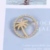 Söt runda kokosnöt palm brosch kvinnor pärla rhinestone träd broscher kostym lapel pin mode smycken tillbehör