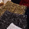 Sexy mini skirt autumn new high waist slimming fish scale sequin skirt elastic bag hip short skirt women korean style women X0428