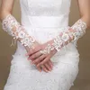 Lace Appliques Beads Bruids Handschoenen Ivoor Wit Lange elleboog Lengte Vingerloze elegante handschoenen Bruiloftaccessoires