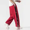 2022 uomini pantaloni di lino rosso stile cinese uomini streetwear stampa pantaloni larghi gamba maschile pantaloni larghi jogger pantaloni harem dropshipping pantaloni L220706