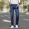 Mäns jeans höst lösa tjocka blå män företag casual bomull avancerad stretch denim byxor manliga märke klädmens värme22