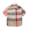 Plaid Moda Bambino Bambini Ragazzo Estate Manica corta Stampa Camicia con bottoni a quadri T-shirt Abbigliamento 2-8 anni