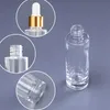 Rensa glas Essential Oil Bottles 30ml 1oz lång runda pipette ögondropp parfymflaska med gyllene lock