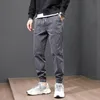 メンズジーンズの日本語スタイルファッションメンルーズフィットアーミーグリーングレーカジュアルカーゴパンツハームズボンストリートウェアヒップホップジョガーパンツメン