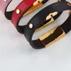 Дизайнерская цепочка связывания браслеты женские мужские классические цветочные металлические пряжки кожаные обертки браслет браслет мода ювелирных изделий цвета могут выбрать 60мк