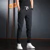 Herrbyxor sommarmän elastisk midja avslappnad koreansk streetwear lättvikt bomullsgrå smal passbyxor 220826