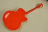 Guitare électrique orange semi-creuse pour gaucher avec gros trémolo