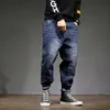 Mäns jeans herrar harem byxor modefickor Desinger Löst fit baggy moto män sträcka retro streetwear avslappnad avsmalnande 42269o