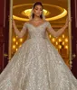 Scintillante abito da ballo dell'Arabia Saudita Abito da sposa con paillettes Applicazioni con spalle scoperte Abiti da sposa a maniche lunghe Abiti da sposa in cristallo Su misura S