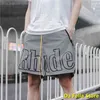 Шорты Rhude Дизайнер серого цвета мужчины женщины отражающий эффект внутри Tag Us/Size Размер негабаритного колена UK X1116 Высокое качество