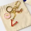 Porte-clés de marque de styliste, pendentif de sac à main de voiture, chaîne de charme, porte-clés de haute qualité, bibelot, cadeaux, accessoires faits à la main, cadeau exquis