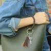 Luxury Armband Keychain För Kvinnor Ladies Bohemia Trendig Tassel Soft Silicone Wristlet Strap Bag Plånbok Bil Nyring Tillbehör