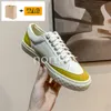 Diseñador Cnel Zapatos casuales zapatillas de deporte de lujo para mujer 22SS WMNS Zapatillas de deporte de lona de gamuza con cordones Gris Púrpura Verde Negro Amarillo Naranja Zapatillas de deporte de gamuza de moda para mujer