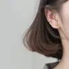 Boucles d'oreilles en argent sterling 925 à clip vissées non percées Boucles d'oreilles en forme de boucle d'oreille en forme de vague creuse en zircon pour femmes