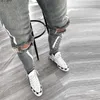 Ripped Hole Jeans för män Hip Hop Cargo Pant Distressed Light Blue Denim Skinny Kläder Full längd Höstbyxor 220328