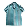 Män designer skjortor sommar shoort hylsa casual skjortor mode lösa polos strandstil andningsbara tshirts tees klädstorlek m-3xl3178